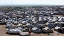 عائلات عراقية واسبانية تغادر مخيم الهول 