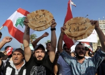 145 دولاراً مقابل 563.. فجوة المعيشة في لبنان