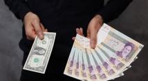 العملة الإيرانية عند أدنى مستوياتها التاريخية أمام الدولار