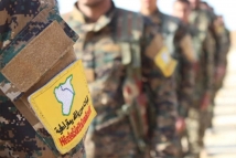 “أسايش” تحتجز الشاب المتسبب بإنزال العلم السوري