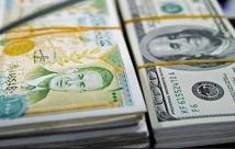المصرف المركزي السوري يرفع سعر صرف الدولار أمام الليرة